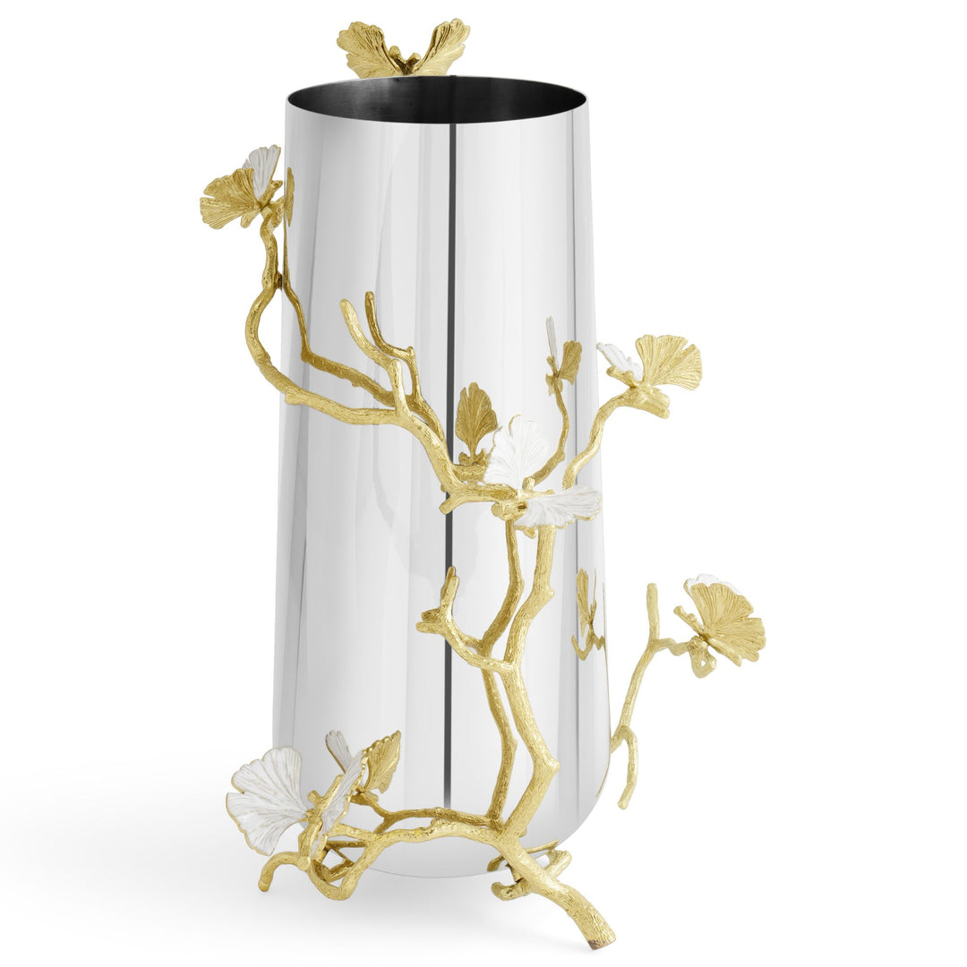 A Michael Aram modern cylindrical metal large vase, 12.75 inches high, with a reflective silver-tone body, decorated with gold ginkgo branches and white ginkgo leaf accents that resemble butterflies.