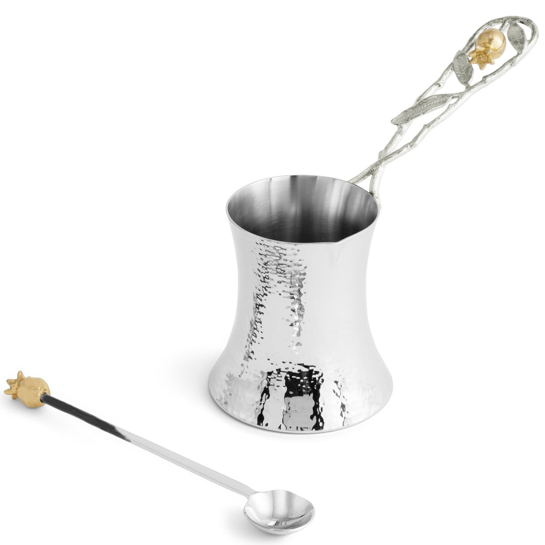 Alternate angled view of Michael Aram Pomegranate Silver & Gold coffee pot with flared hammered silver-tone body, decorative branch handle and gold-tone pomegranate details. With two tone co-ordinating spoon