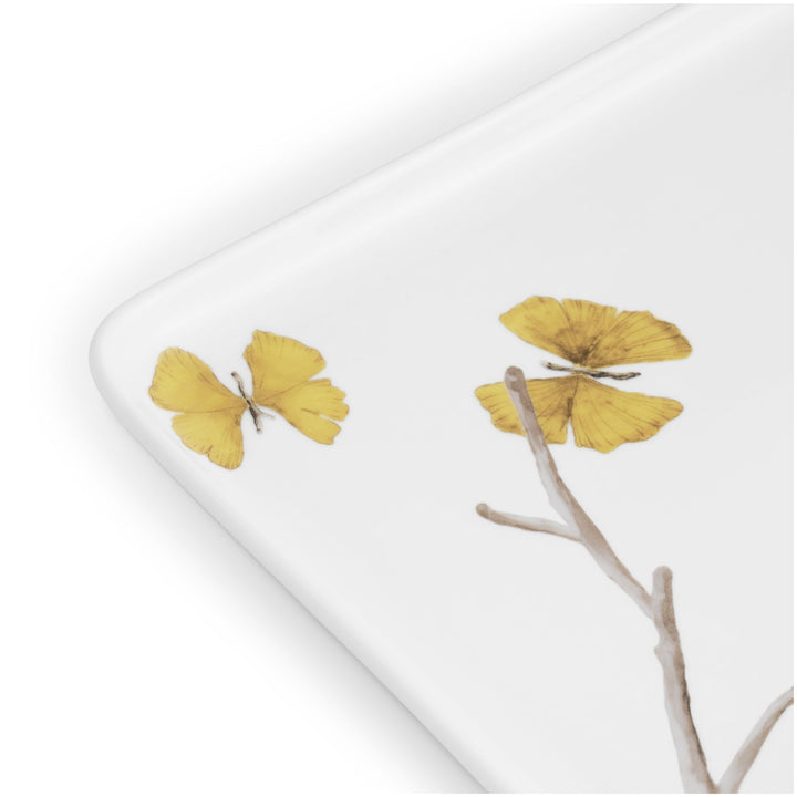 Michael Aram butterfly ginkgo porcelain tray with lip, white tray with brown branches and gold butterflies closeup
