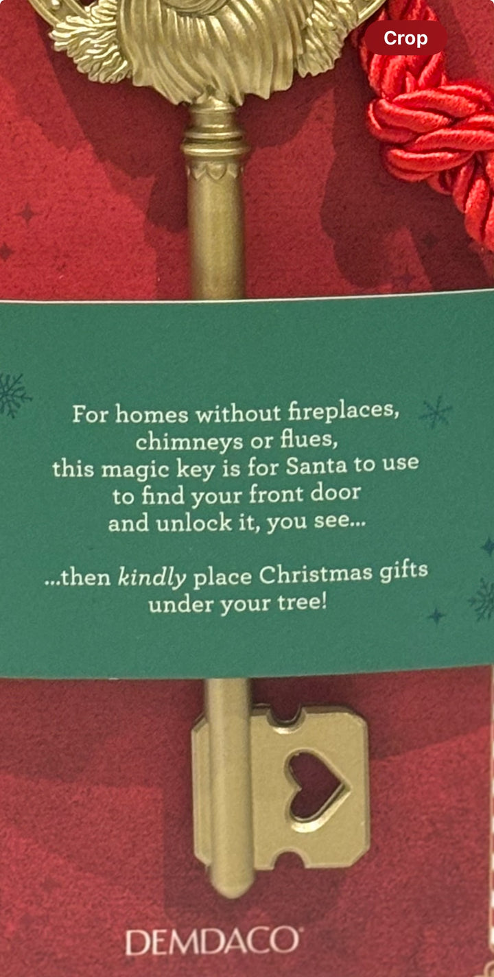 Decorative key with text on a red and green background, featuring the brand 'DEMDACO'. For kids without chimneys waiting for Santas gifts