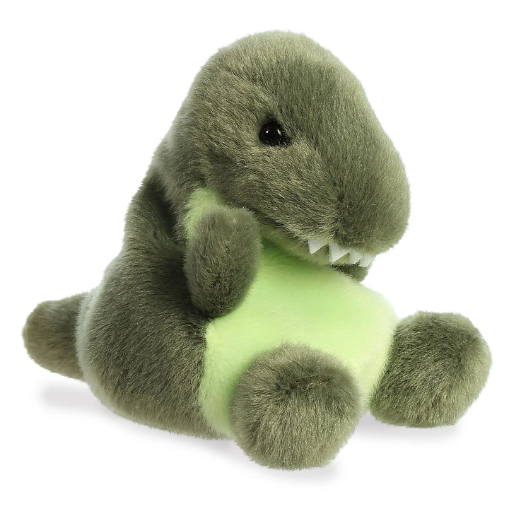 Green plush toy resembling a dinosaur on Tyranno Palm Pals