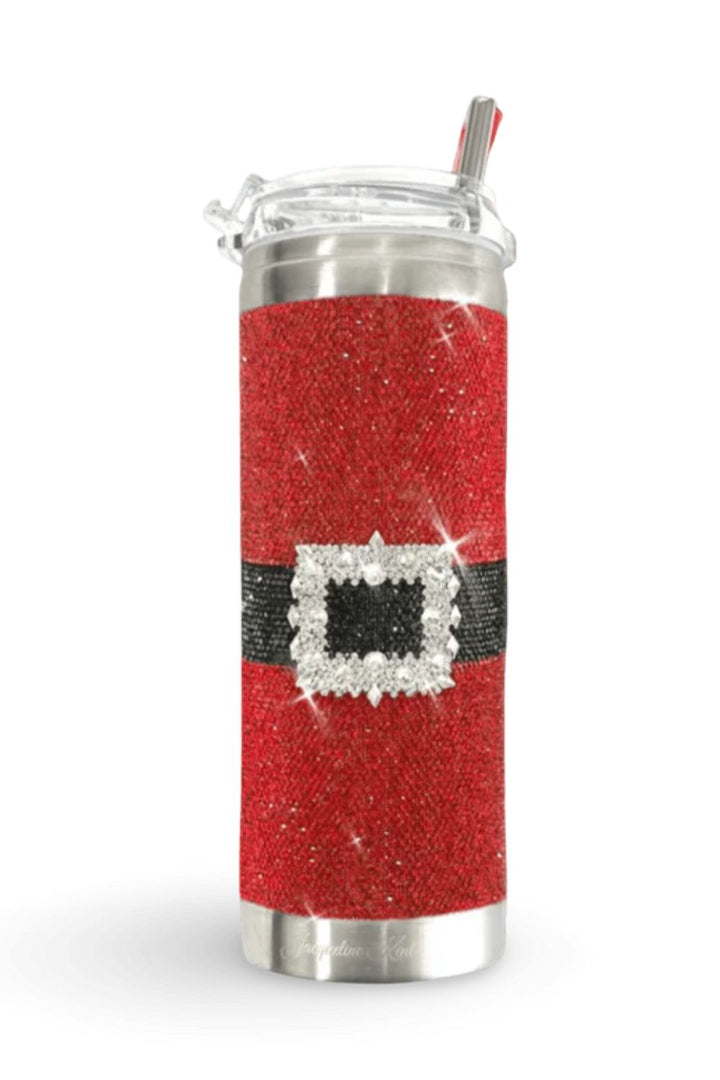 A Jacqueline Kent fancy Christmas themed  insulated travel tumbler covered in red Rihinestone with a black belt design and a embellished clear rhinestone buckle, featuring a clear lid with a straw.
