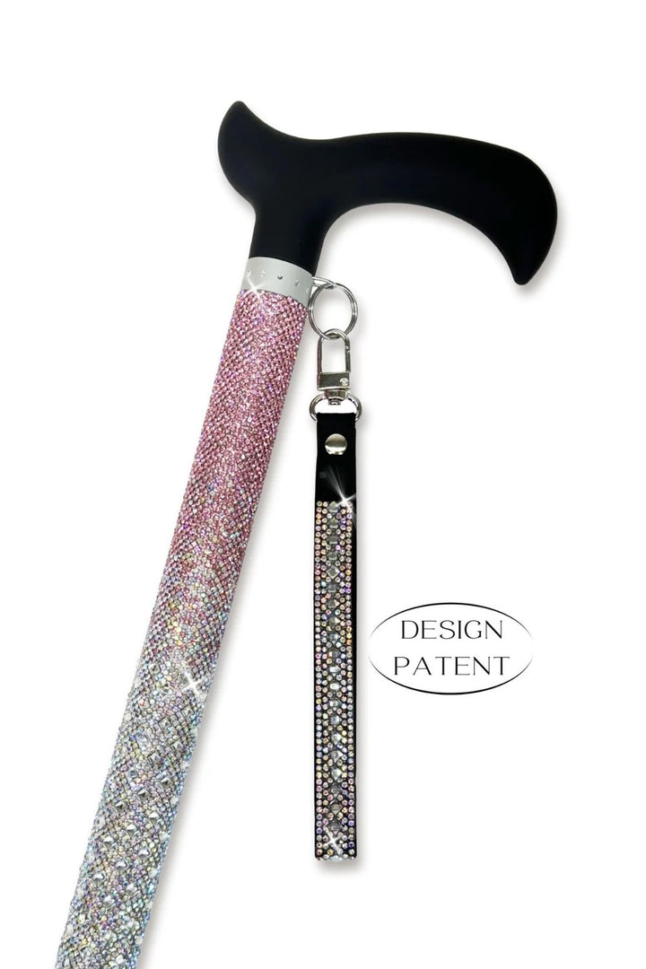 Jacqueline Kent fancy rhinestone walking cane with pink ombre rhinestones, black derby handle and rhinestone wrist strap