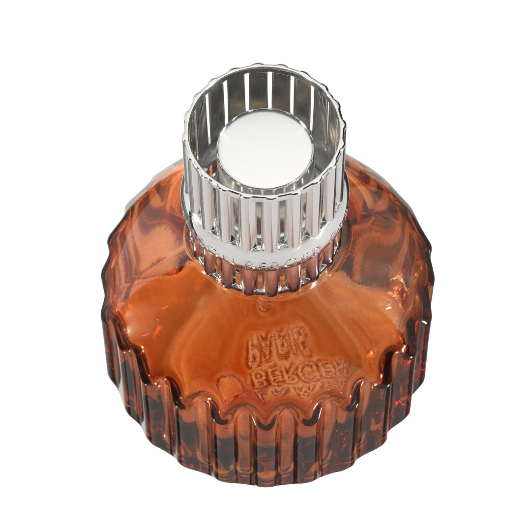 Lampe Berger Cannelo Paprika home fragrance lamp viewed from above, showing its silver-coloured slotted diffuser top mimicing the same fluted pattern on the glass vessel.
