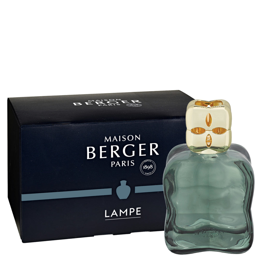 Maison Berger Paris Lampe Berger Cosy Green sculpted glass lampe with a gold-coloured diffuser cap beside the Maison Berger dark  blue signature gift box 