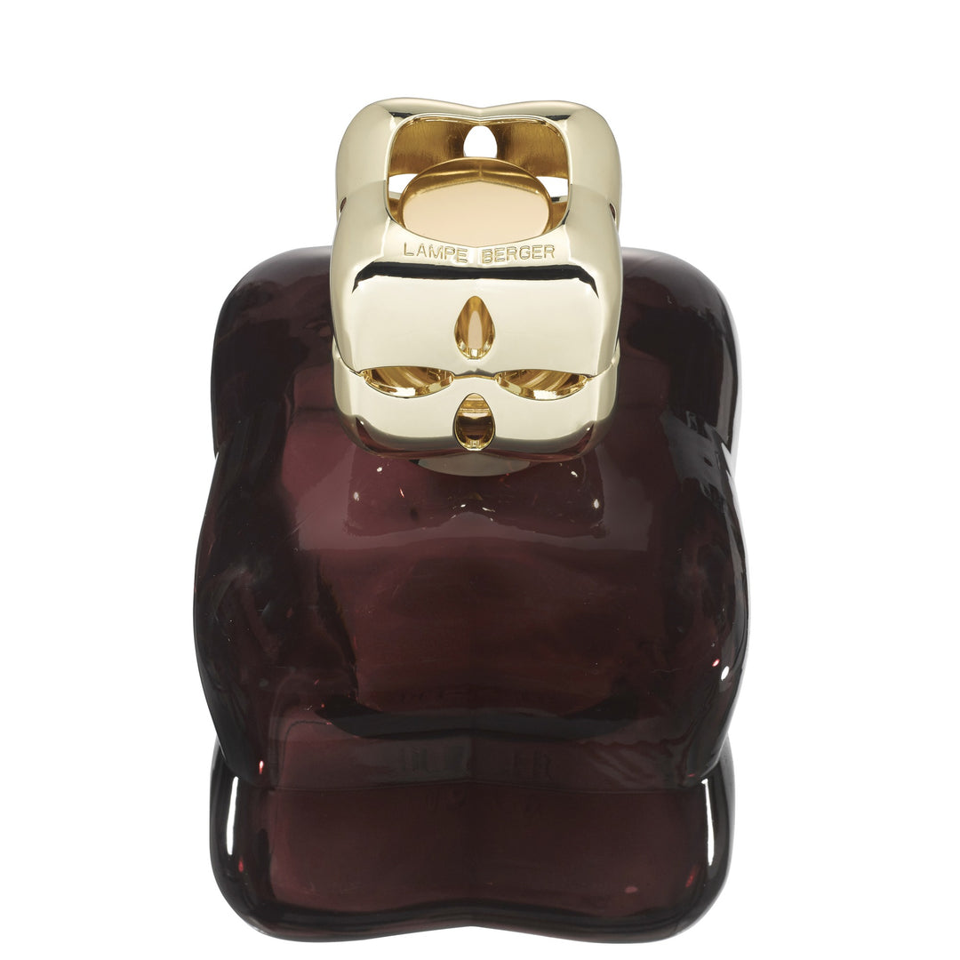 Lampe Berger Cosy Plum home fragrance lamp viewed from above, showing its gold-coloured top with oval cut-outs.
