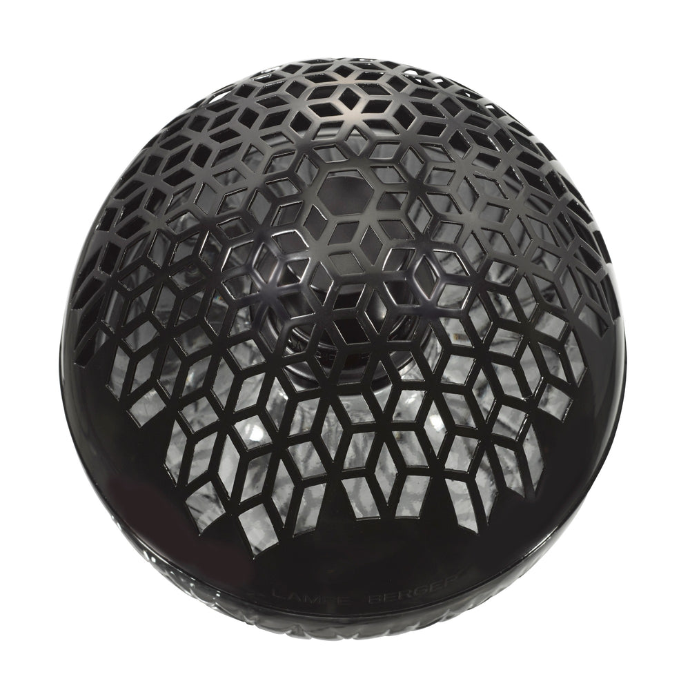 Lampe Berger Luka Black home fragrance lamp viewed from above, showing  close up of its black domed diffuser cap with geometric cut-outs.
