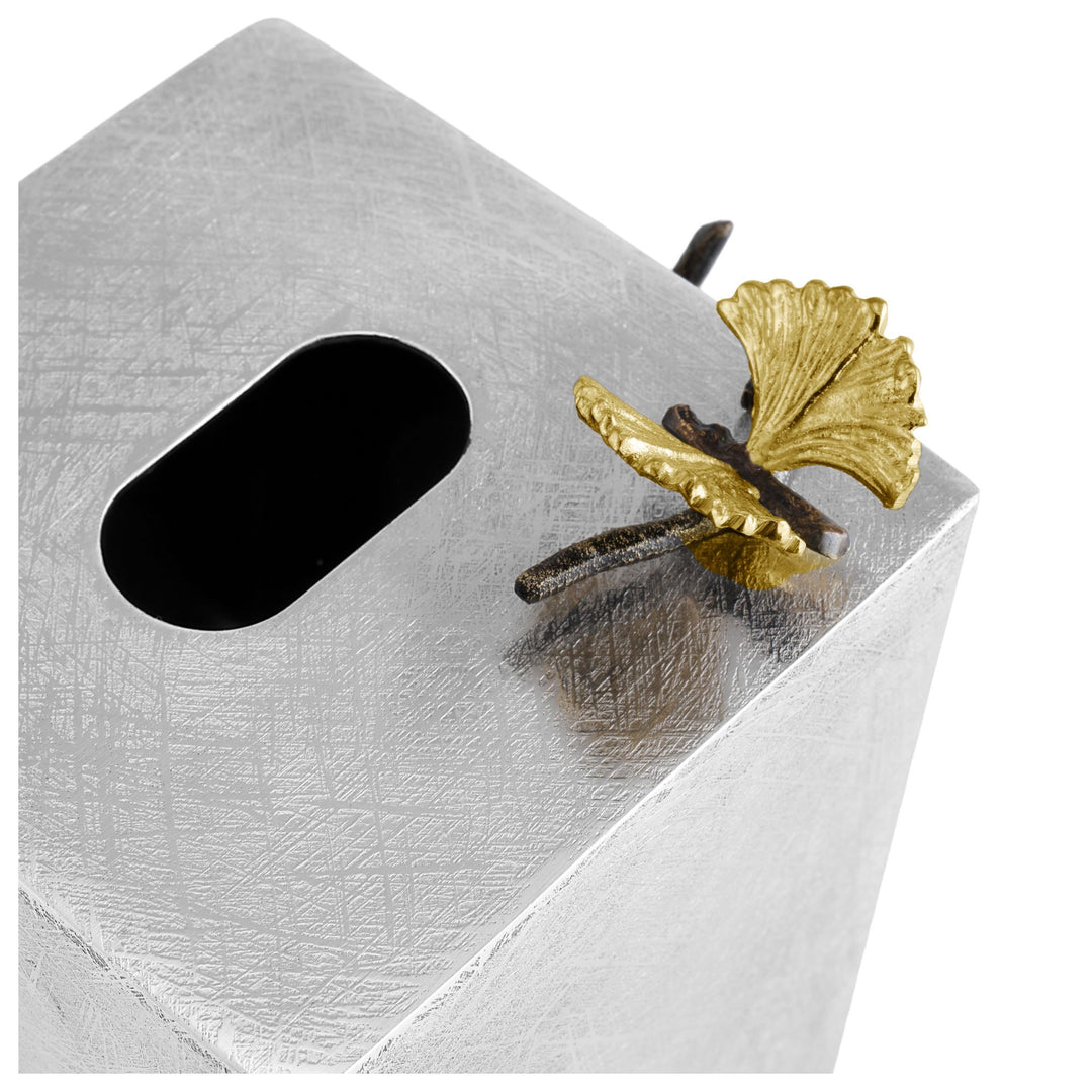 Michael Aram Butterfly Ginkgo Square Tissue Box handcrafted with hand textured stainless steel, natural and oxidized brass, featuring sculptural butterfly and ginkgo leaf details. Close up