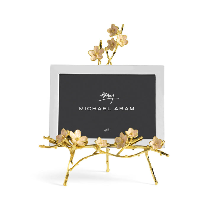 Michael Aram Cherry Blossom Easel Photo Frame 4x6 with pink enamel cherry blossoms and goldtone details. Front facing