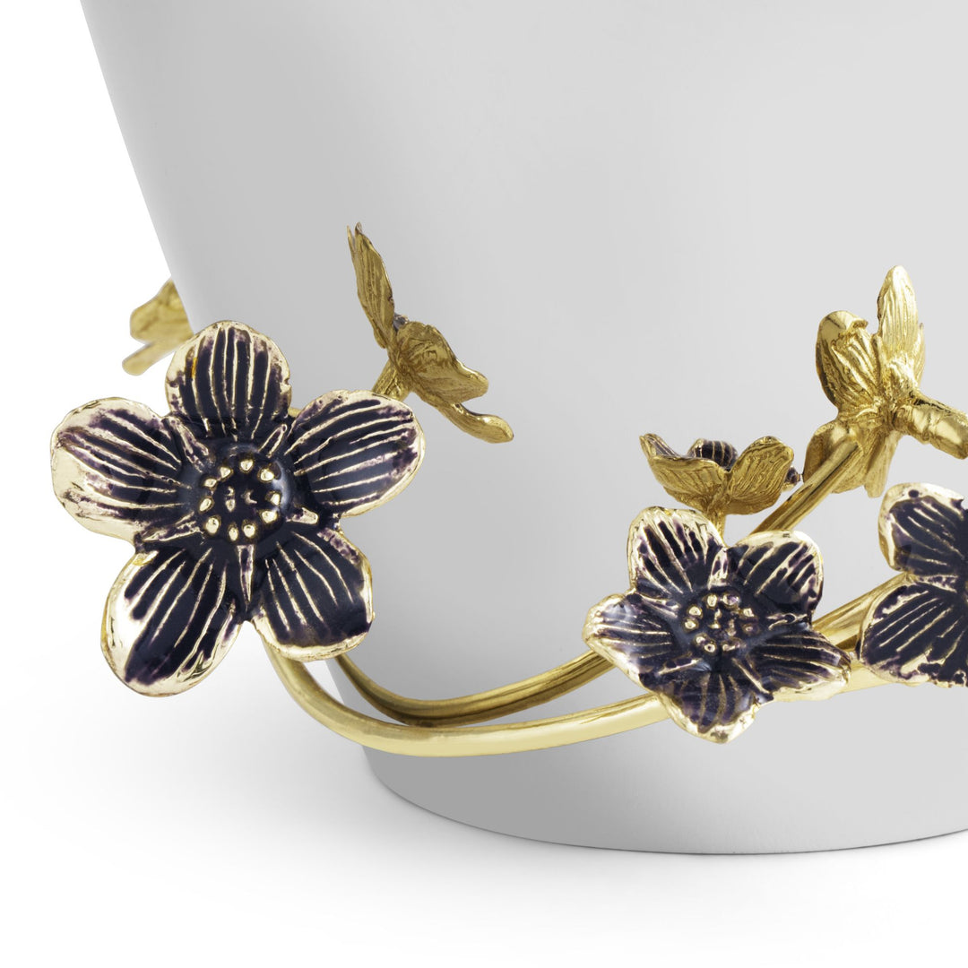 Michael Aram Forget Me Not Cremation Urn LARGE, handcrafted in stainless steel, natural brass, and purple enamel from the Forget Me Not Collection. Close up