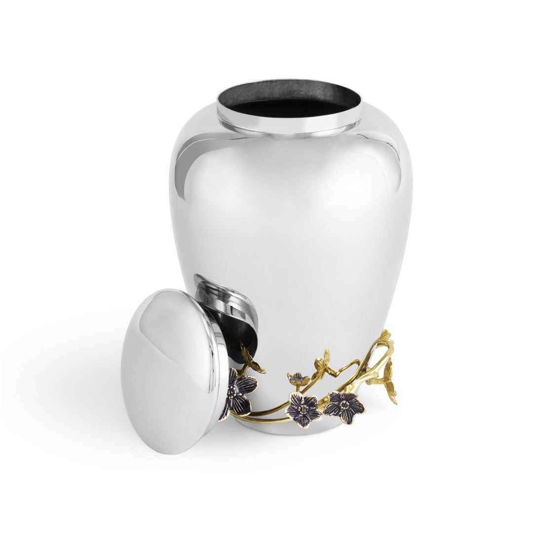 Michael Aram Forget Me Not Cremation Urn LARGE, handcrafted in stainless steel, natural brass, and purple enamel from the Forget Me Not Collection. Lid open.