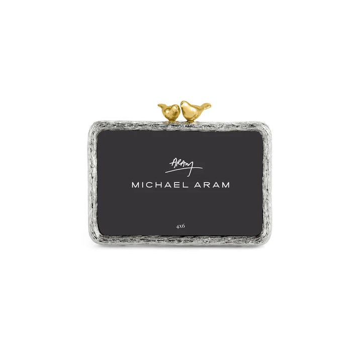 Michael Aram Lovebirds 4x6 picture frame with textured silver-tone frame and two sculpted gold-tone lovebirds nestled together at the top