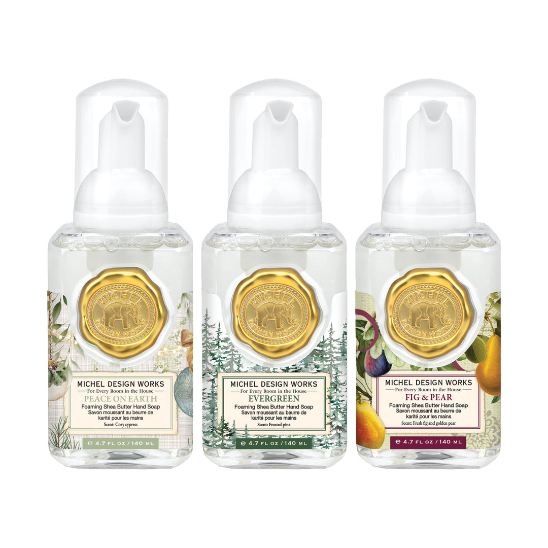 Michel Design Works mini foaming soap set showing three 140 ml pump bottles: Peace on Earth, Evergreen, and Fig & Pear.