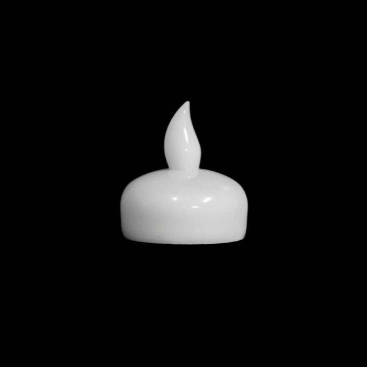 Close up single Modgy water-activated floating LED candle designed for use with Modgy Luminary Sets