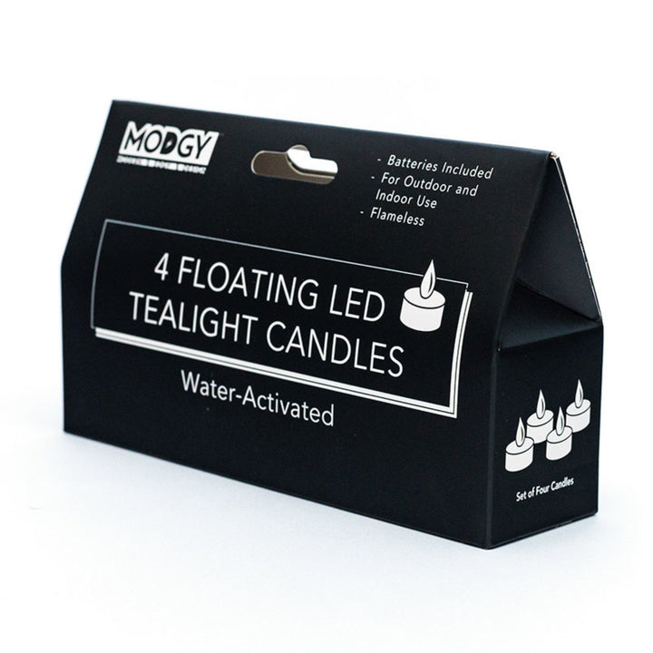 Black retail packaging box for set of 4 Modgy water-activated floating LED tealight candles, with white text and candle illustrations.