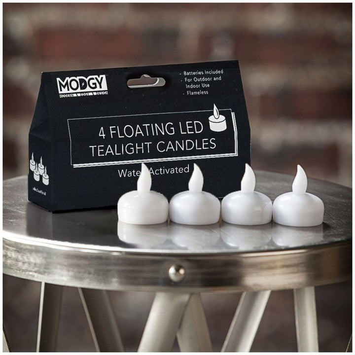 Package of Modgy Water-Activated Floating LED Candles – Replacement Set of 4 with batteries included.