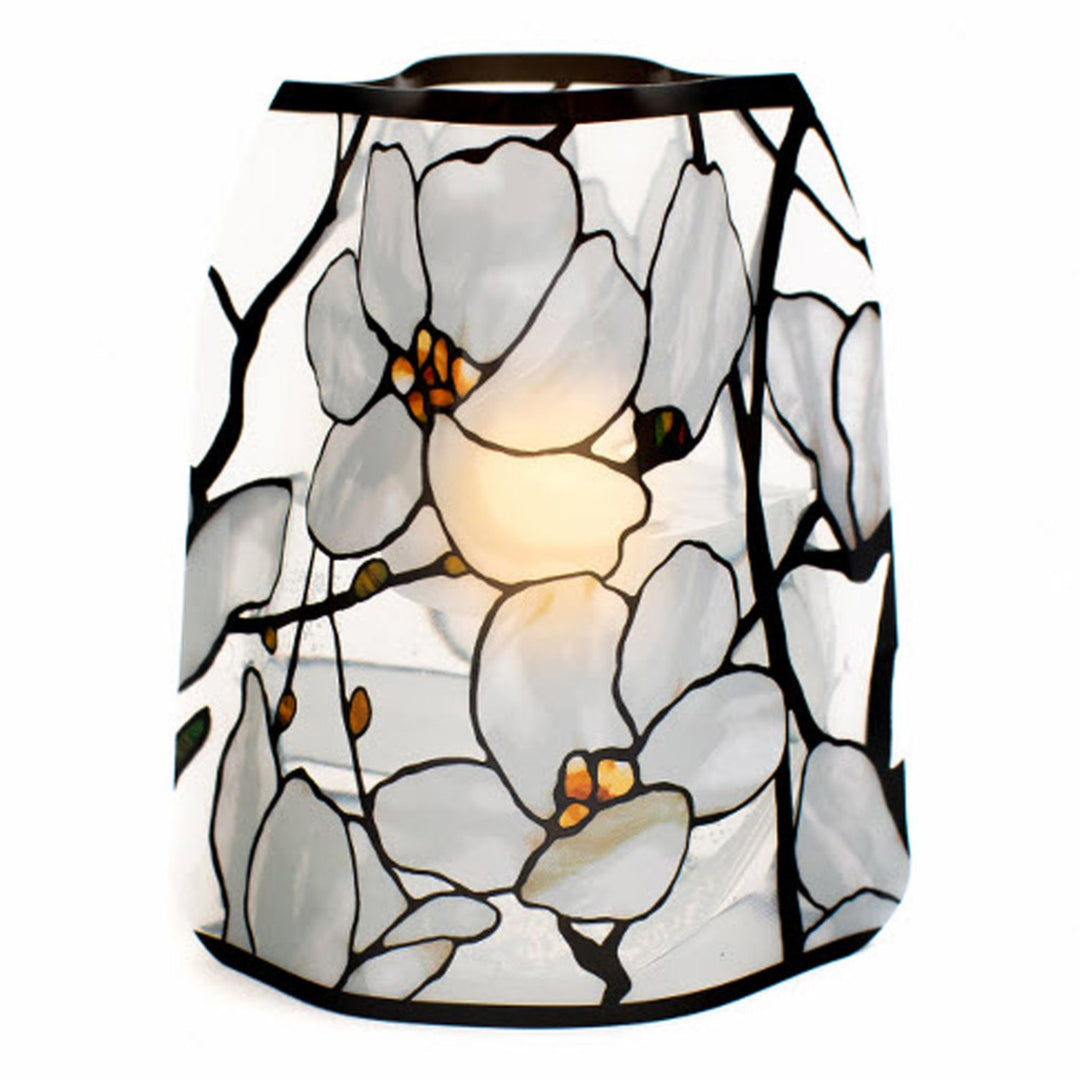 Stained-glass-style reusable Modgy LED luminary featuring Louis C. Tiffany's iconic Magnolia Window design with large white magnolia flowers, illuminated with a water-activated floating LED candle.